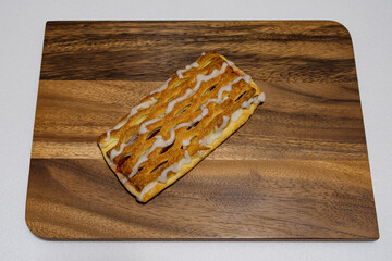  sweet and delicious strawberry  pastry on a wooden board