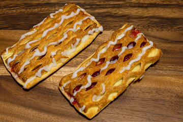  sweet and delicious strawberry  pastry on a wooden board