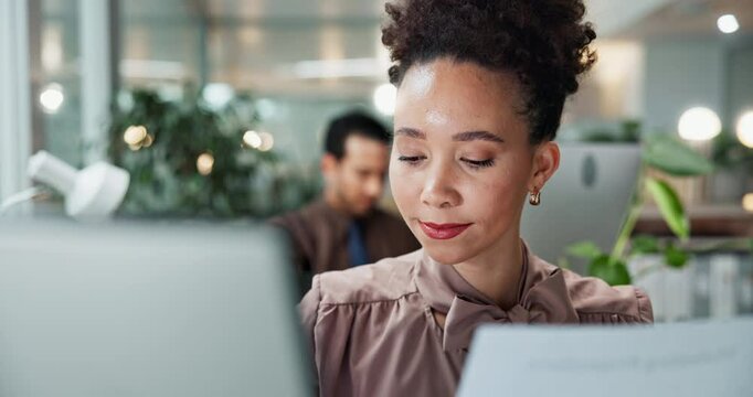Paperwork, accountant and business woman on computer with sales revenue, review report and savings. Technology, document and happy worker check info, comparison and financial bookkeeping in office