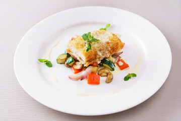 fries fish with organic vegetables