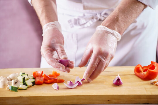 .Chef cutting fresh and delicious vegetables for cooking