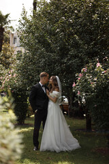 Beautiful and Elegant Wedding Ceremony in a Stunning Lush Garden Setting Outdoors