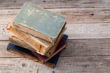 Old books in a library . Education background