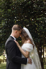 Beautiful and Elegant Wedding Ceremony in a Stunning Lush Garden Setting Outdoors