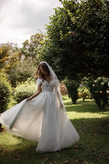 An Elegant Bride Captured in a Beautifully Dreamy Garden Setting for a Special Occasion