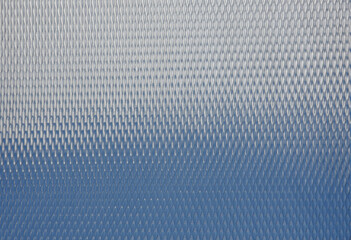 Modern metallic textured surface background with reflection, Blue and silver gray colors. Grid pattern glossy metal panel. Tough but with soul, sky reflection.
