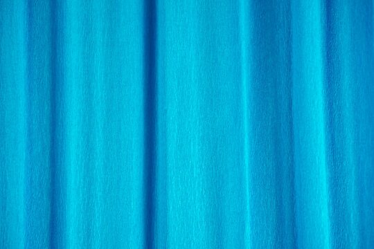 Corrugated paper crumpled blue abstract background