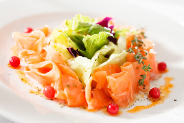 fish carpaccio on the white plate