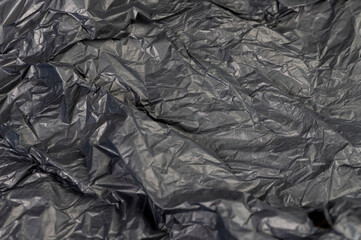 a piece of black soft paper for packaging goods and objects