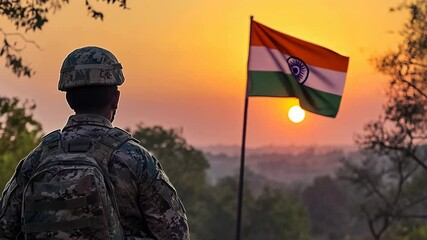 A uniformed soldier stands facing a vibrant sunset behind an Indian flag. The scene evokes patriotism and reflection, capturing a quiet moment of national pride during the evening. - Powered by Adobe