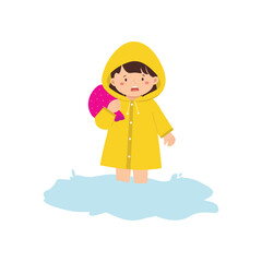 Child in Yellow Raincoat Standing in Water