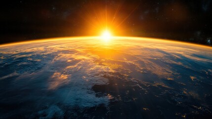 Fototapeta premium Sunrise over Earth from space.