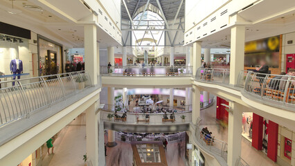 Many shops in multi-level department store or shopping mall timelapse hyperlapse.