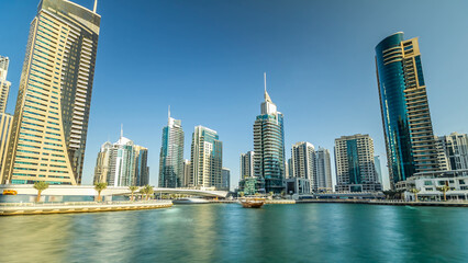 Fototapeta premium Dubai Marina modern towers in Dubai at day time timelapse