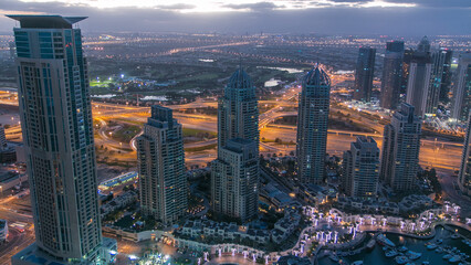 Obraz premium Dubai marina harbor panorama from night to day transition timelapse