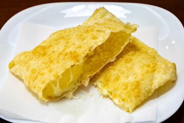 Traditional Brazilian fried cheese pastry known as pastel de feira