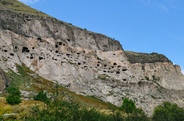 View of Vardzia caves. Vardzia is a cave monastery site in southern Georgia, excavated from the slopes of the Erusheti Mountain on the left bank of the Kura River. Travel for tourists