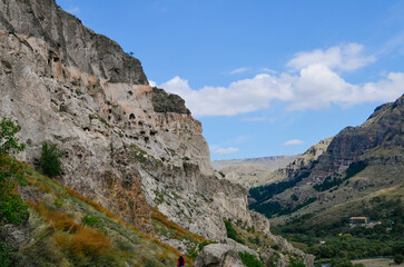 View of Vardzia caves. Vardzia is a cave monastery site in southern Georgia, excavated from the slopes of the Erusheti Mountain on the left bank of the Kura River. Travel for tourists