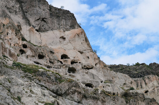 View of Vardzia caves. Vardzia is a cave monastery site in southern Georgia, excavated from the slopes of the Erusheti Mountain on the left bank of the Kura River. Travel for tourists
