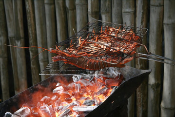 BBQing Lobsters on the Ocean in Liberia
