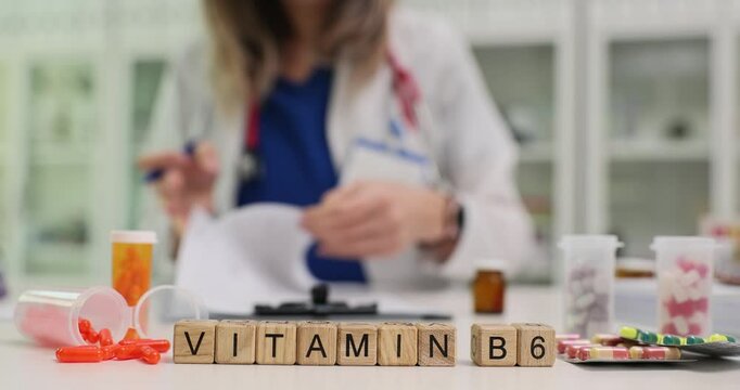 A healthcare professional is thoroughly analyzing Vitamin B6 supplements within a pharmacy setting today