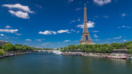 Fototapeta premium The Eiffel tower timelapse hyperlapse from bridge over the river Seine in Paris