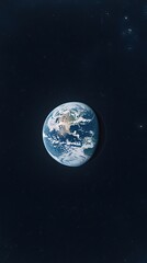 Obraz premium Detailed representation of planet Earth with vivid geography, bright oceans, and landmasses, set against a dark blue backdrop