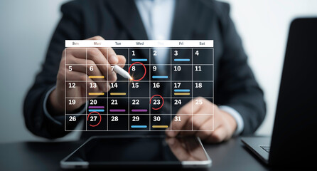 Close-up of a businessman planning schedules with a futuristic digital calendar interface. Perfect for appointment reminders, time management, and task planning