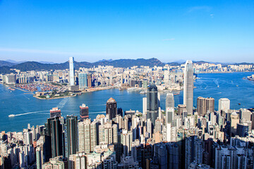 Fototapeta premium Stunning Panoramic View of Hong Kong Skyline and Victoria Harbour