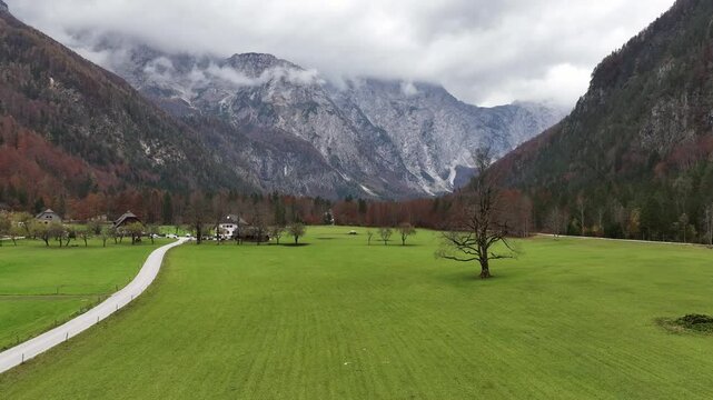Aerial video of the picturesque Logar Valley (Logarska Dolina) and Solcava panoramatic road in autumn, Slovenia