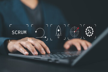 SCRUM, agile development methodology concept. Businessman using laptop with SCRUM icons on virtual screen
