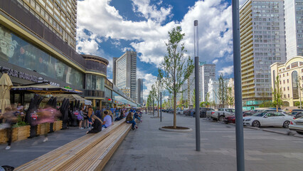 Walk on New Arbat Avenue timelapse hyperlapse popular tourist street in Moscow with shops and cafe