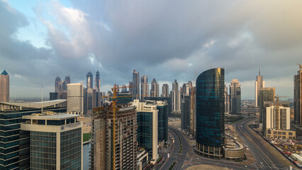 Dubai business bay towers early morning aerial timelapse.