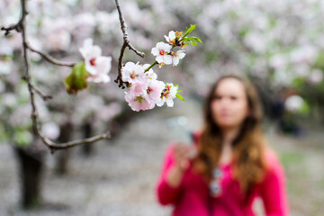woman with almond blossoms