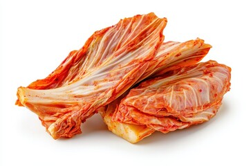 Isolated kimchi spicy fermented napa cabbage traditional Korean dish piled on a white background