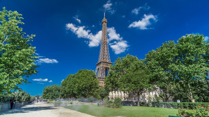 Eiffel Tower from Siene river waterfront in Paris timelapse hyperlapse, France