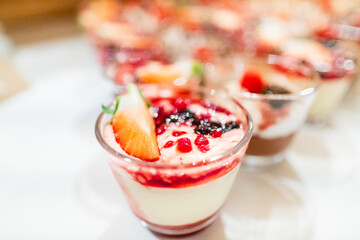 Delicious Dessert with Fresh Strawberries and Red Berries Served in a Glass