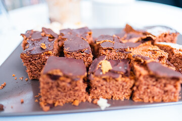 Delicious Chocolate Frosted Brownies Displayed on a Tray for Sharing and Enjoyment