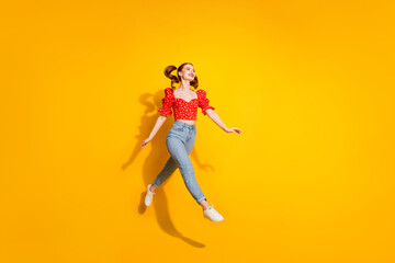 Photo portrait of young red hair funky positive girl active running to buy one more lipstick sale isolated on yellow color background