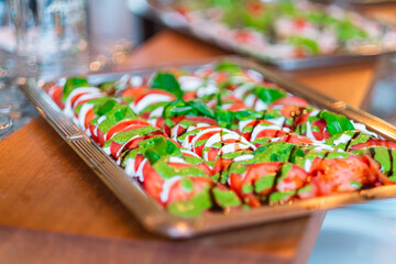 Fresh Platter of Caprese Salad with Tomato, Mozzarella, and Basil