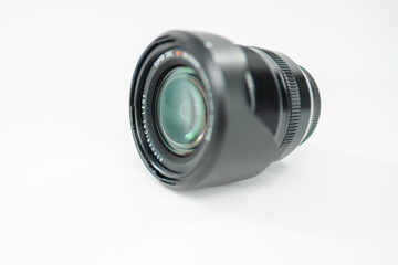 Close-Up View of a Professional Camera Lens Isolated on a White Background