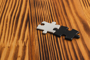 puzzle pieces, black and white, concept of unity between opposites