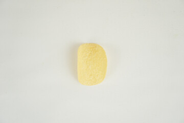 Crispy potato chips isolated on white background