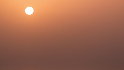 Sun close-up at sunset timelapse