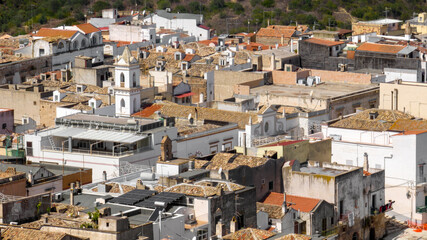 Aerial view of houses, apartments and buildings located in the historic center of the town of Bernalda, in the province of Matera, Basilicata, Italy. It is a traditional Italian village.