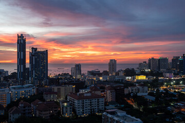 Sunset view from the 22nd floor of a condominium in Pattaya town Chonburi district Thailand Asia
