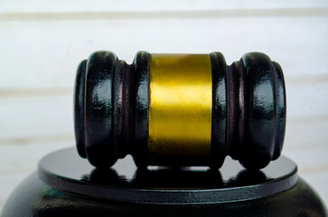 Close up of lawyer's gavel with customizable space for text. Laws and regulations concept