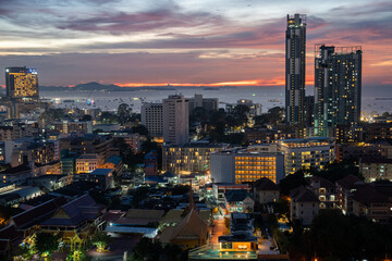 Sunset view from the 22nd floor of a condominium in Pattaya town Chonburi district Thailand Asia