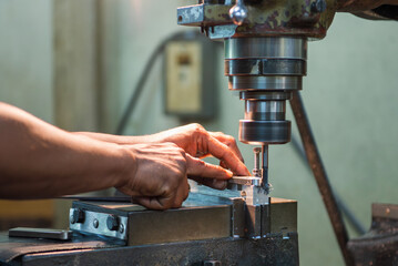  The metal working operation on NC milling machine.