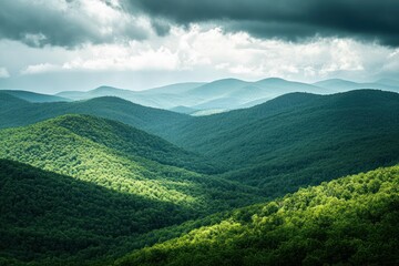 Naklejka premium Lush Green Mountain Landscape Under Cloudy Sky